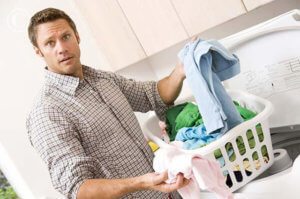 man_doing_laundry_mon1020811